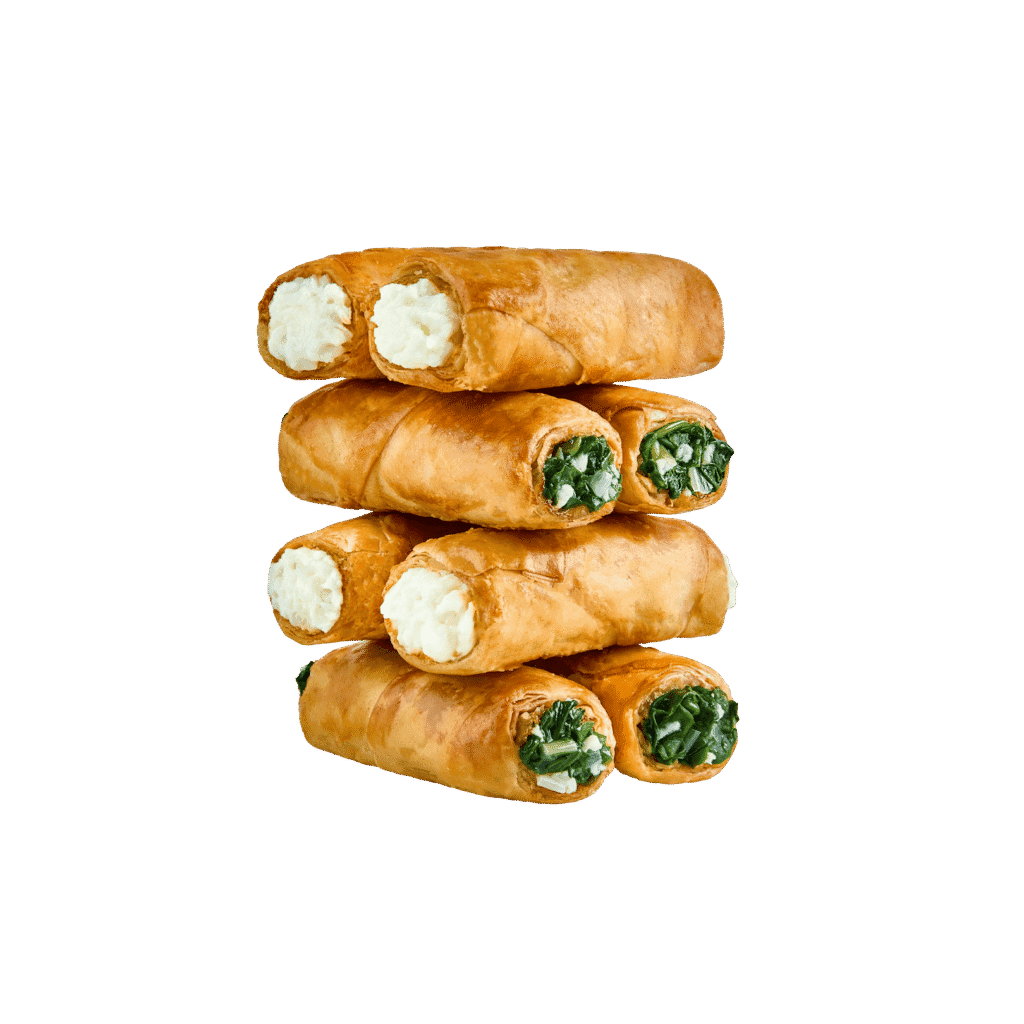 Stacked Greek phyllo pastries — cheese and spinach rolls